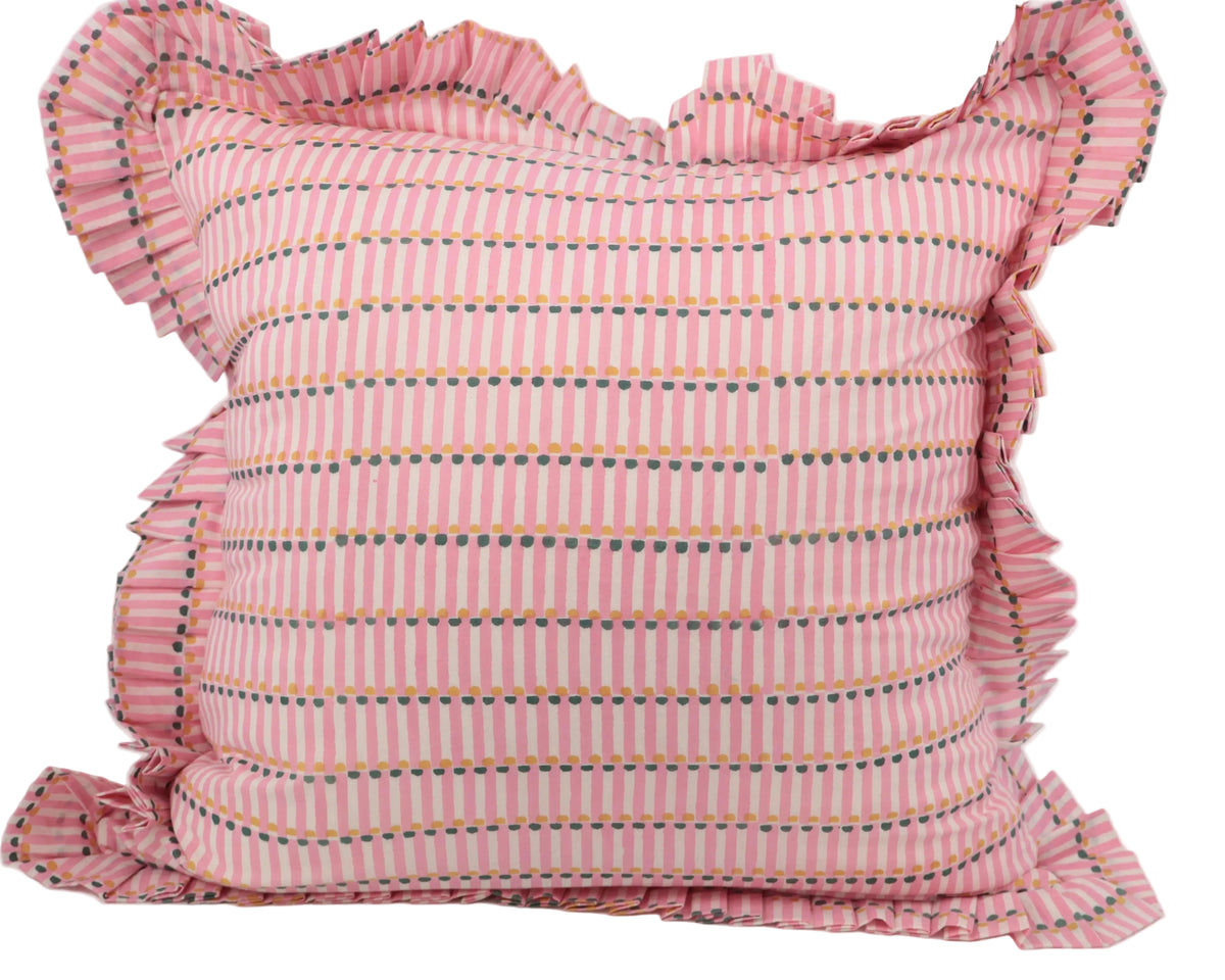 Pink striped pillow with ruffled edges on a white background