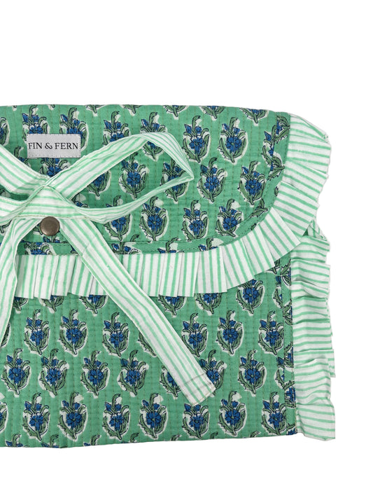 Green patterned fabric with white trim and a button, branded 'Finn & Fern'.